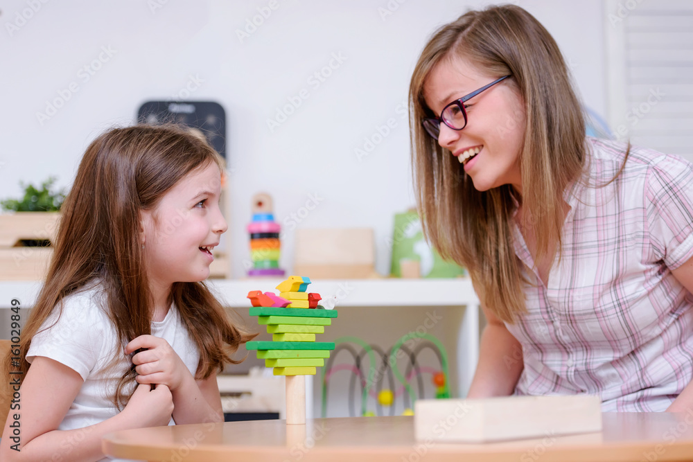 Mother with creative kid having fun time together Mother with creative kid having fun time together