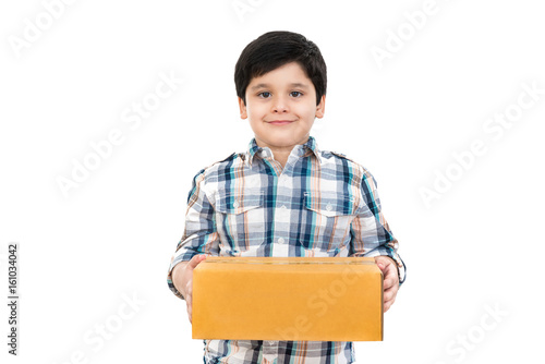 Cute boy holding box, on white background