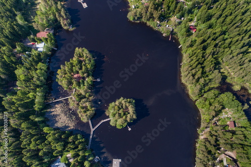 Aerial view on white bridges over water to the islets 
