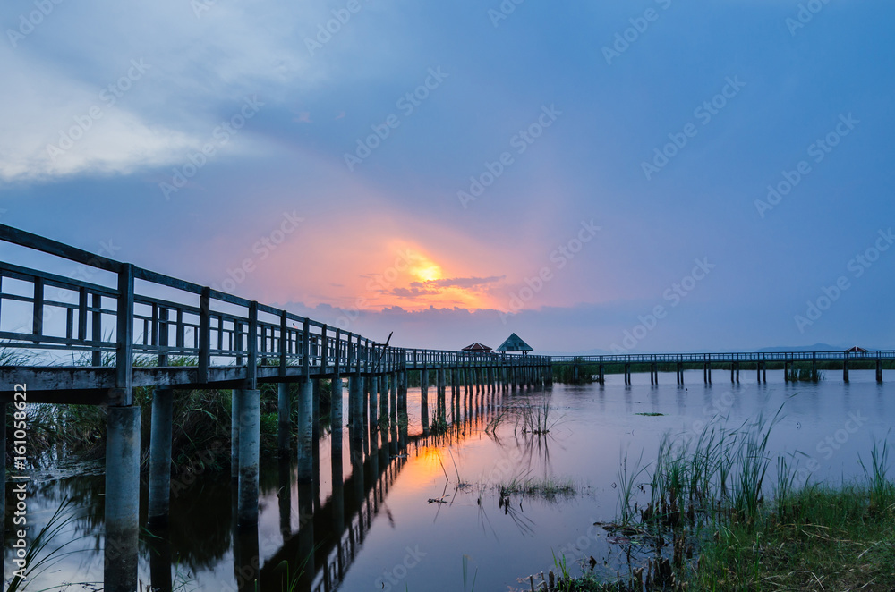 bridge to the lake, sunset, thailand