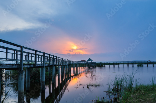 bridge to the lake, sunset, thailand © warut