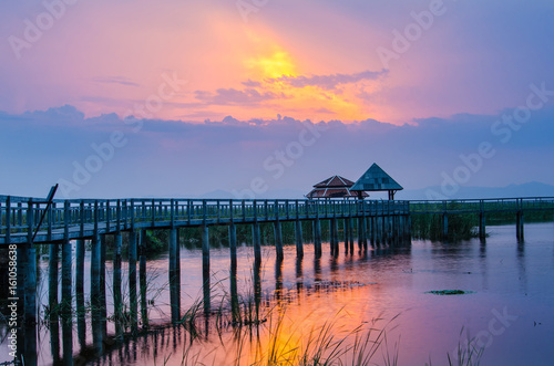 bridge to the lake  sunset  thailand
