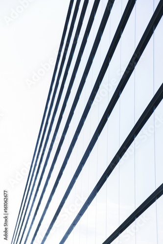 Big modern glass minimalistic office building with straight lines