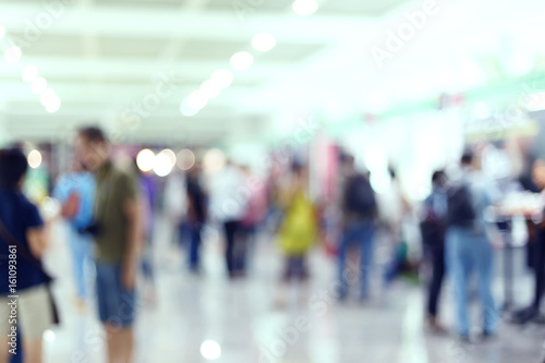 crowd people traveler in airport terminal, image blur used background