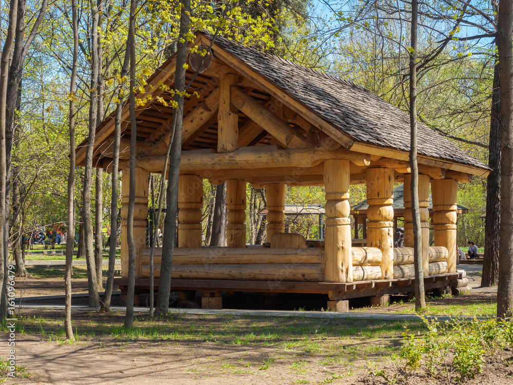 Arbor in a park of logs. Relax in the summer. Arbor in a park of logs. Relax in the summer.