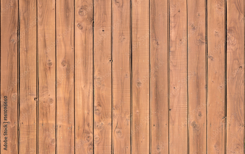 Wood fence, vertical wood planks Wood fence, vertical wood planks