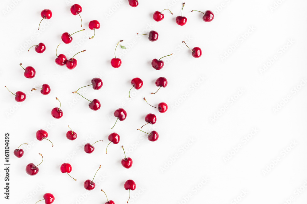Cherry pattern. Fresh sweet cherry on white background. Flat lay, top view, copy space
