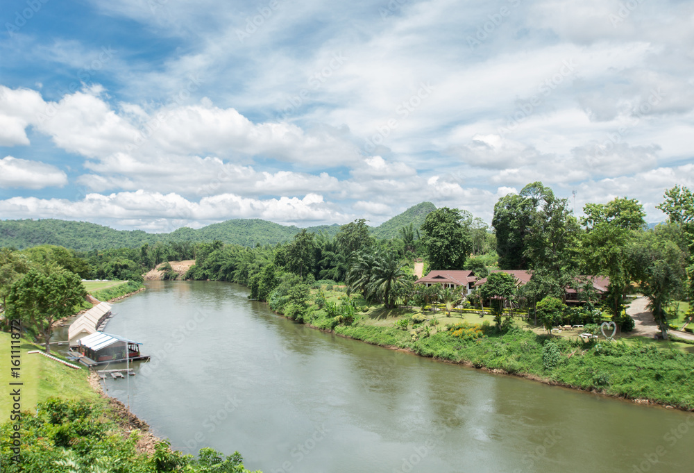 Fototapeta premium Nice view of the mountain river with blue sky and cloud.