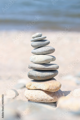 Balance stone on sea coast. Zen rocks on the beach. Feng Shui balance