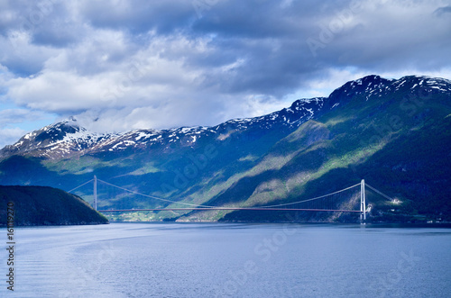 Hardanger Bridge across the Eidfjorden branch of Hardangerfjorden in Hordaland county  Norway. The main span is one of the longest suspension bridge spans in the world  1 310 meters .