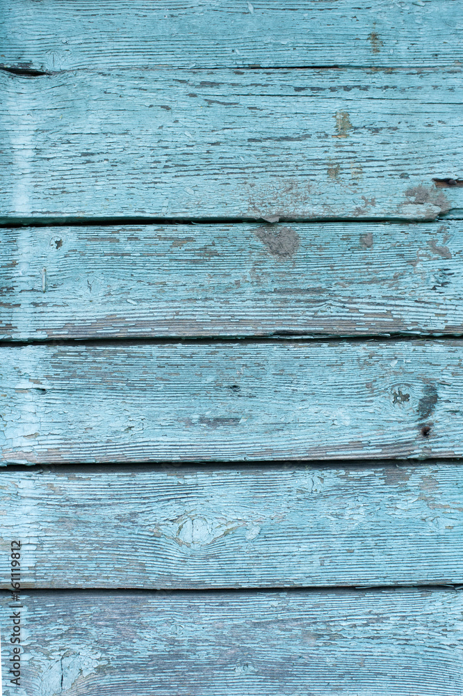Obraz premium Wall of old wooden boards, painted in blue