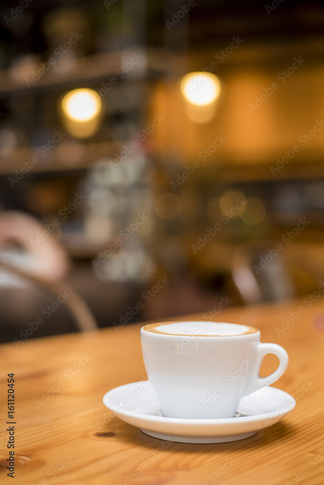 Fototapeta filiżanka kawy w kawiarni
