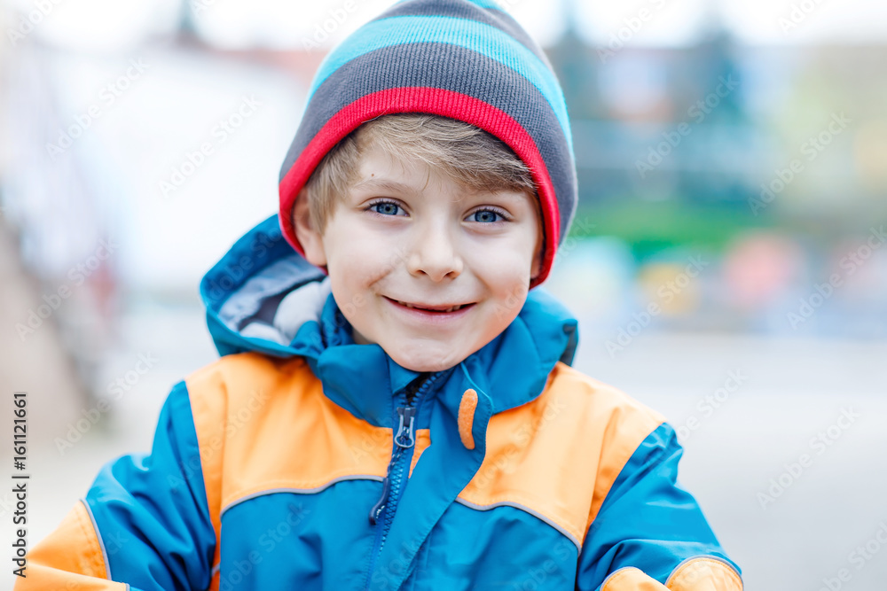 Outdoor fashion portrait of adorable little kid boy wearing colorful clothes Outdoor fashion portrait of adorable little kid boy wearing colorful clothes