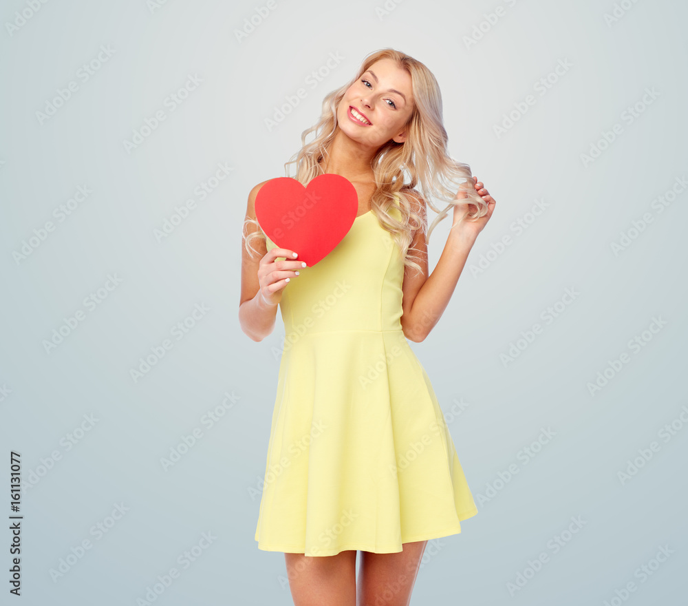 happy young woman with red paper heart over gray happy young woman with red paper heart over gray