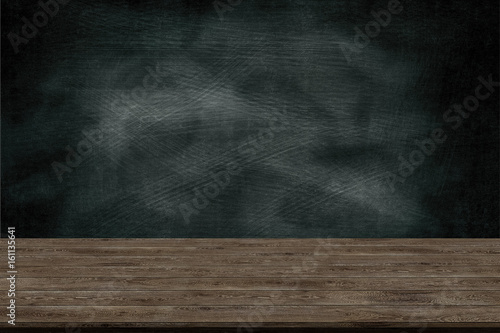 Abstract wooden table texture and chalk rubbed out on blackboard, for graphic add product,Education concept.