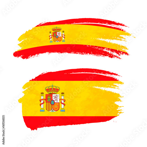 Grunge brush stroke with Spain national flag on white