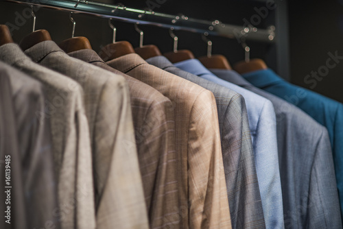 Men suits in detail in a store