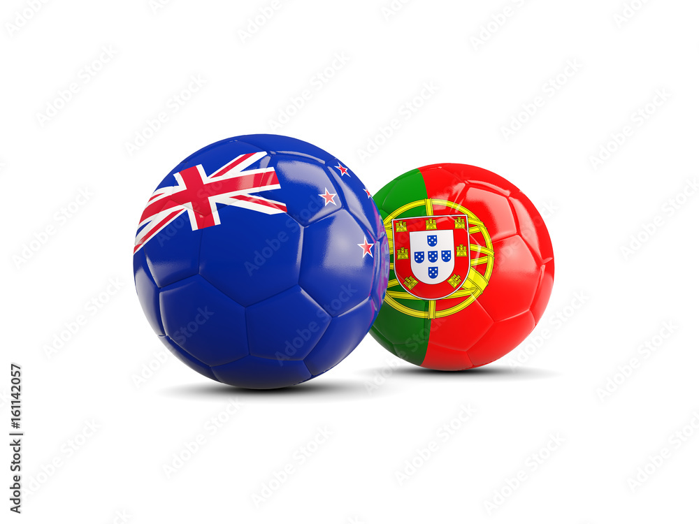 Obraz premium Two footballs with flags of New Zealand and Portugal isolated on white