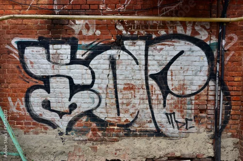 Obraz Piękne graffiti sztuki ulicznej. Streszczenie kolor kreatywny rysunek moda kolory na ścianach miasta. Współczesna kultura miejska. Farba tytułowa na ścianach. Kultura protest młodzieży