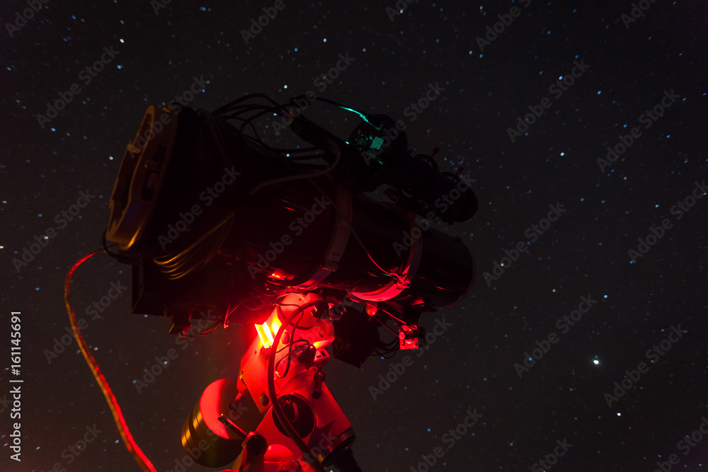 Professional astrophotography telescope equipped with guider scope and ...