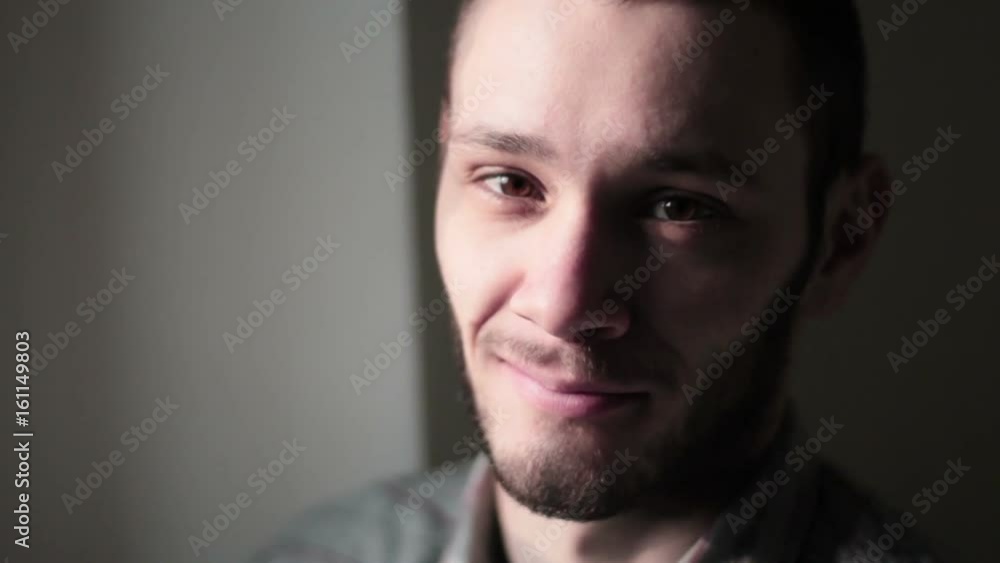 Young Man Looks At Camera, Smiling Close up Young Man Looks At Camera, Smiling Close up