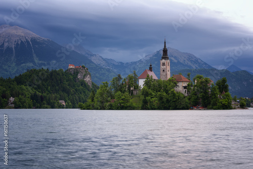 Amazing spring sunrise on Bled lake  Island  Church And Castle with Mountain Range  Stol  Vrtaca  Begunjscica  In The Background - Bled  Slovenia  Europe