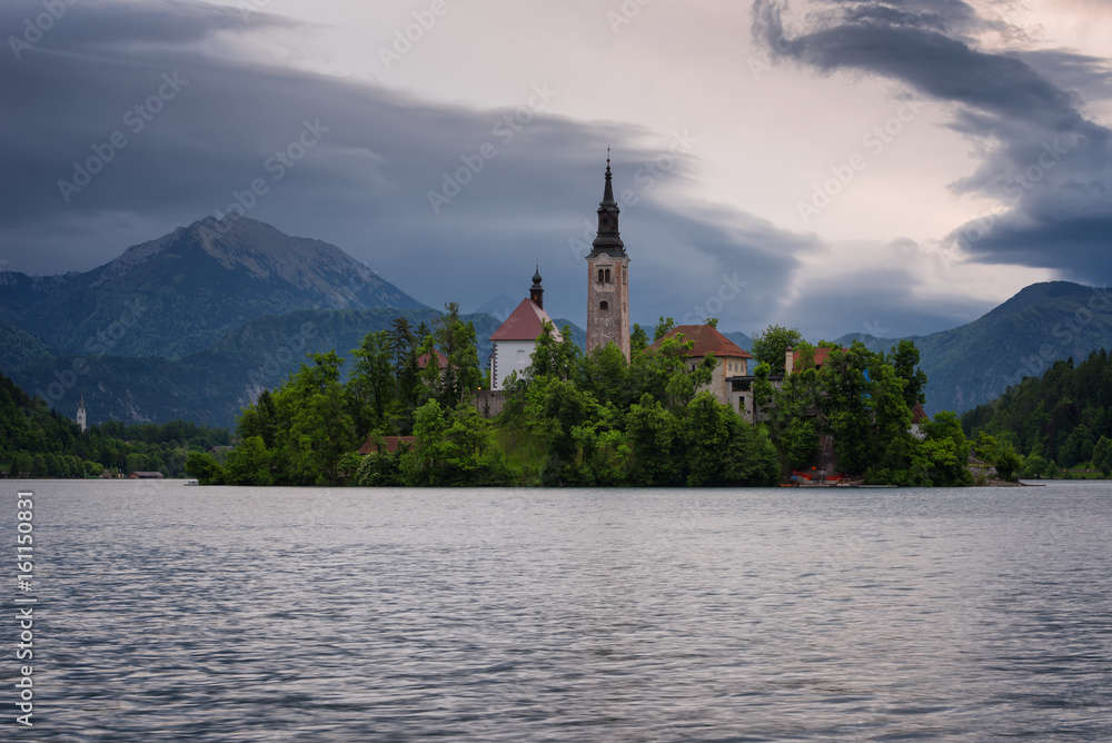 Amazing spring sunrise on Bled lake, Island, Church And Castle with Mountain Range (Stol, Vrtaca, Begunjscica) In The Background - Bled, Slovenia, Europe