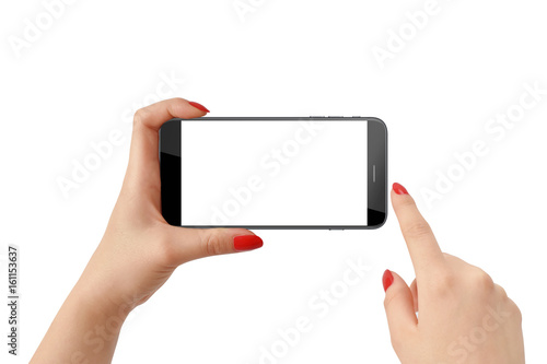 Woman holding smartphone in horizontal position and touching screen, isolated on white background