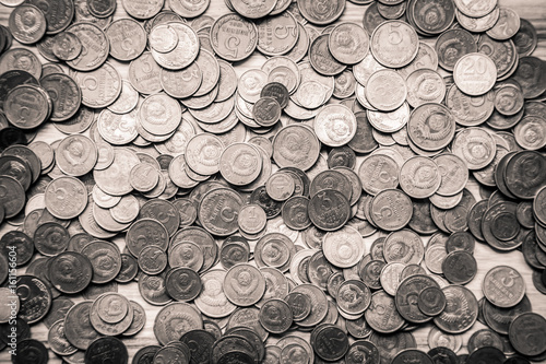 Old soviet coins on a wooden background - monochrome vintage look