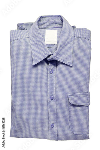 Top view of blue checkered shirt folded isolated on white background