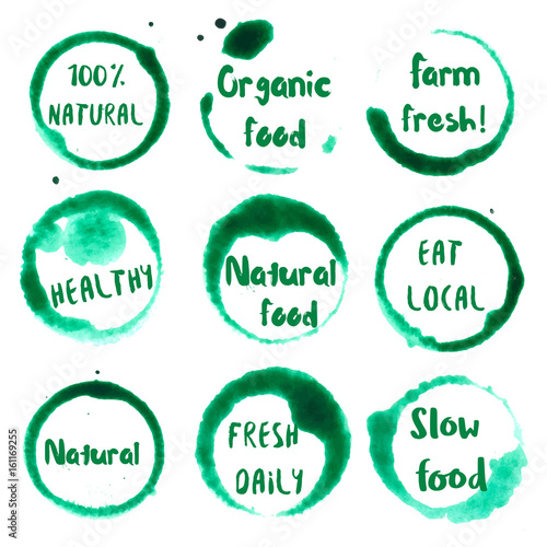 Organic Food collection of round watercolor stains with natural, 100%, eat local, farm fresh, organic food, healthy, fresh daily, slow text. Set of vector Organic Food stamps.