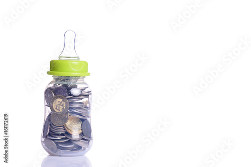 Coins in baby bottle 