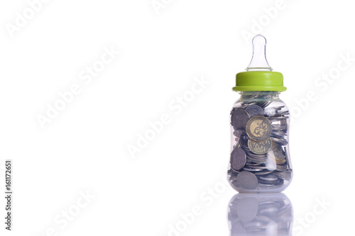 Coins in baby bottle 
