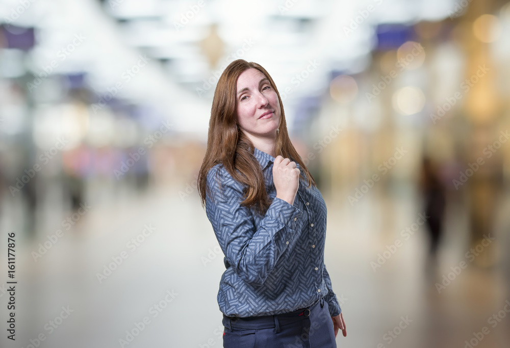 Pretty business woman proud herself over blur background