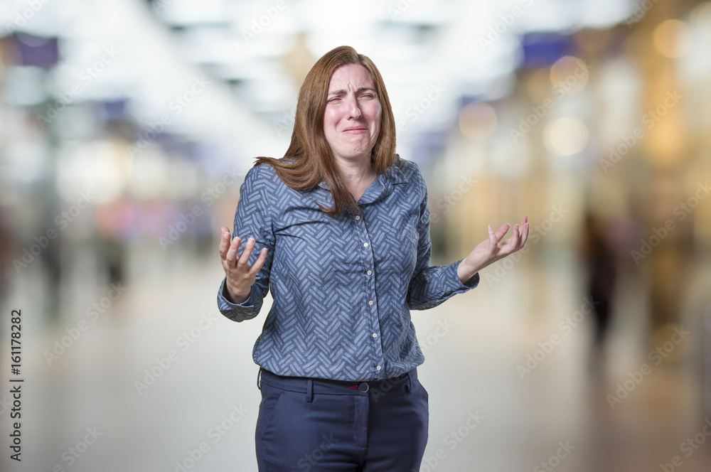 Pretty business woman have big problems over blur background