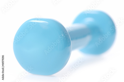 Turquoise dumbbell with round edge in close up