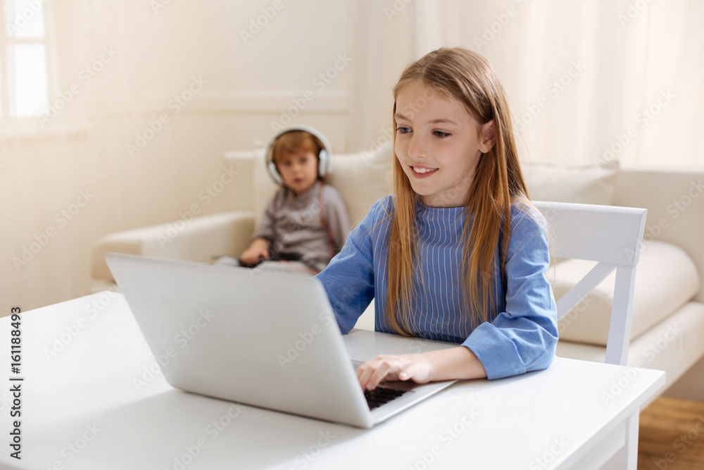 Talented ambitious child writing an essay Talented ambitious child writing an essay