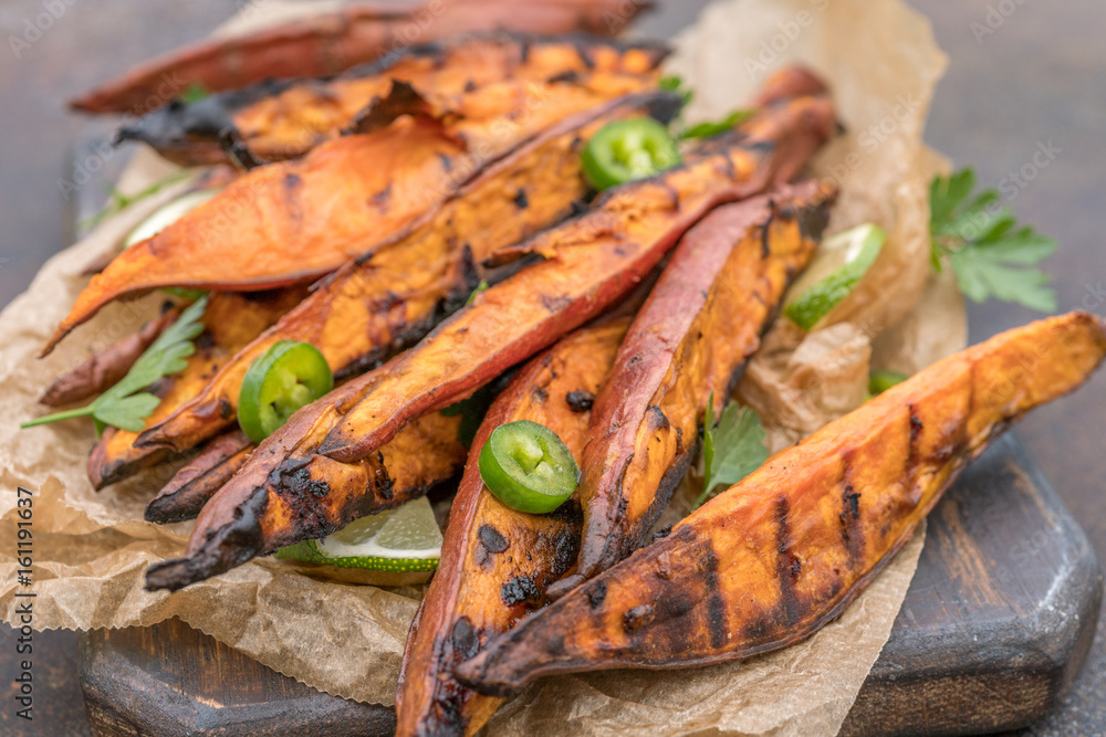 Roasted sweet potatoes on the grill Roasted sweet potatoes on the grill