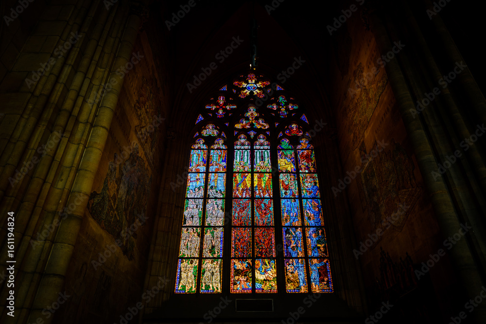 Beautiful stained glass window inside the St. Vitus Cathedral, Prague, Czech Republic