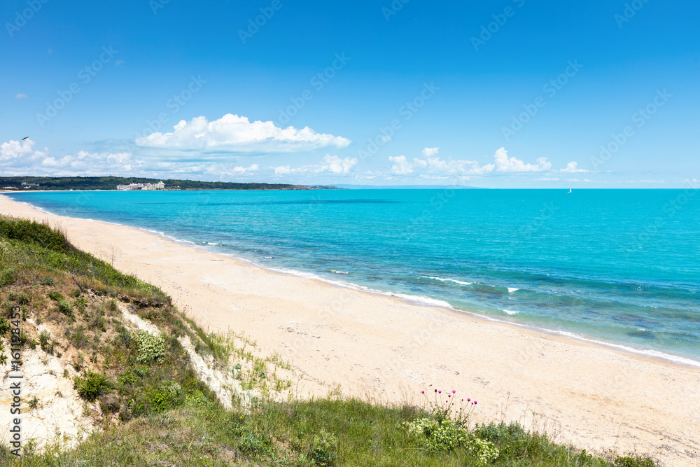 White sands beach and blue sea water