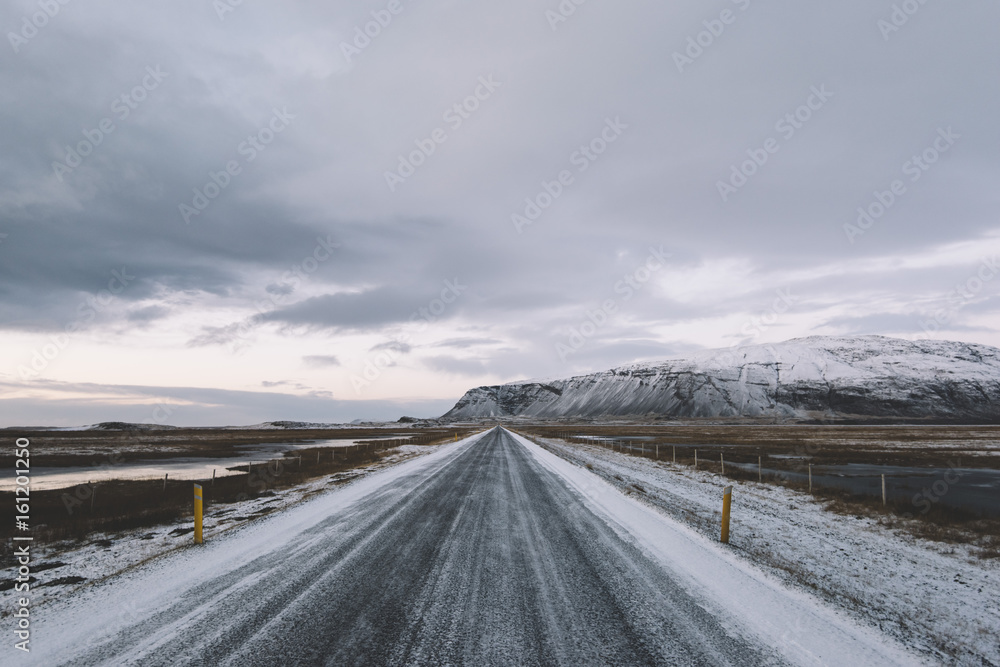 Empty snowy driving road in the Iceland Empty snowy driving road in the Iceland