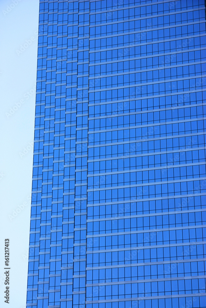close up on modern office building skyscraper blue glass wall close up on modern office building skyscraper blue glass wall