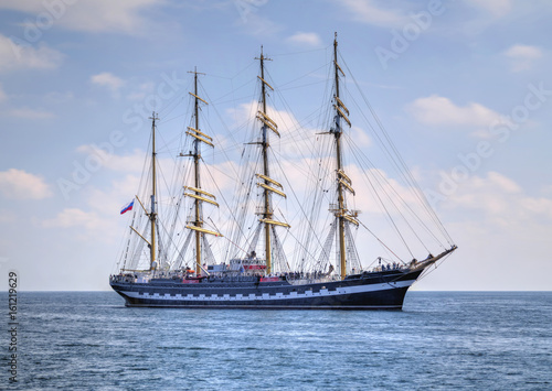 Sailing ship in the blue sea