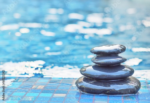 Canvas Print stacked stone on floor swimming pool background