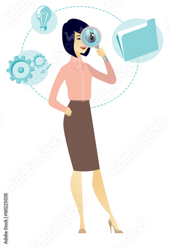 Asian business woman with magnifying glass.