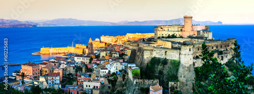 View of beautiful coastal town Gaeta with Aragonese castle over sunset. Italy, Lazio photo