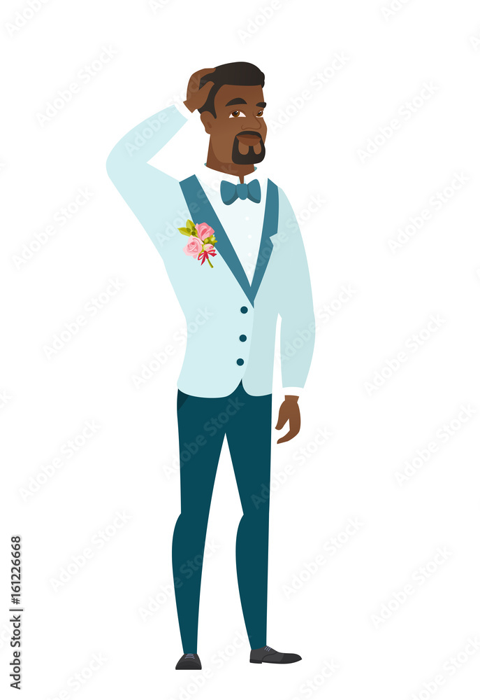 Young african-american groom scratching his head. Young african-american groom scratching his head.