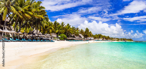 amazing long white sandy beaches of Mauritius island. Tropical holidays scenery