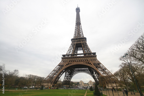 cloudy day with The Eiffel tower in Paris, the most romatic symbol architecture in europe located in france