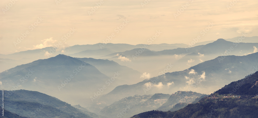 Mountains covered with morning fog.